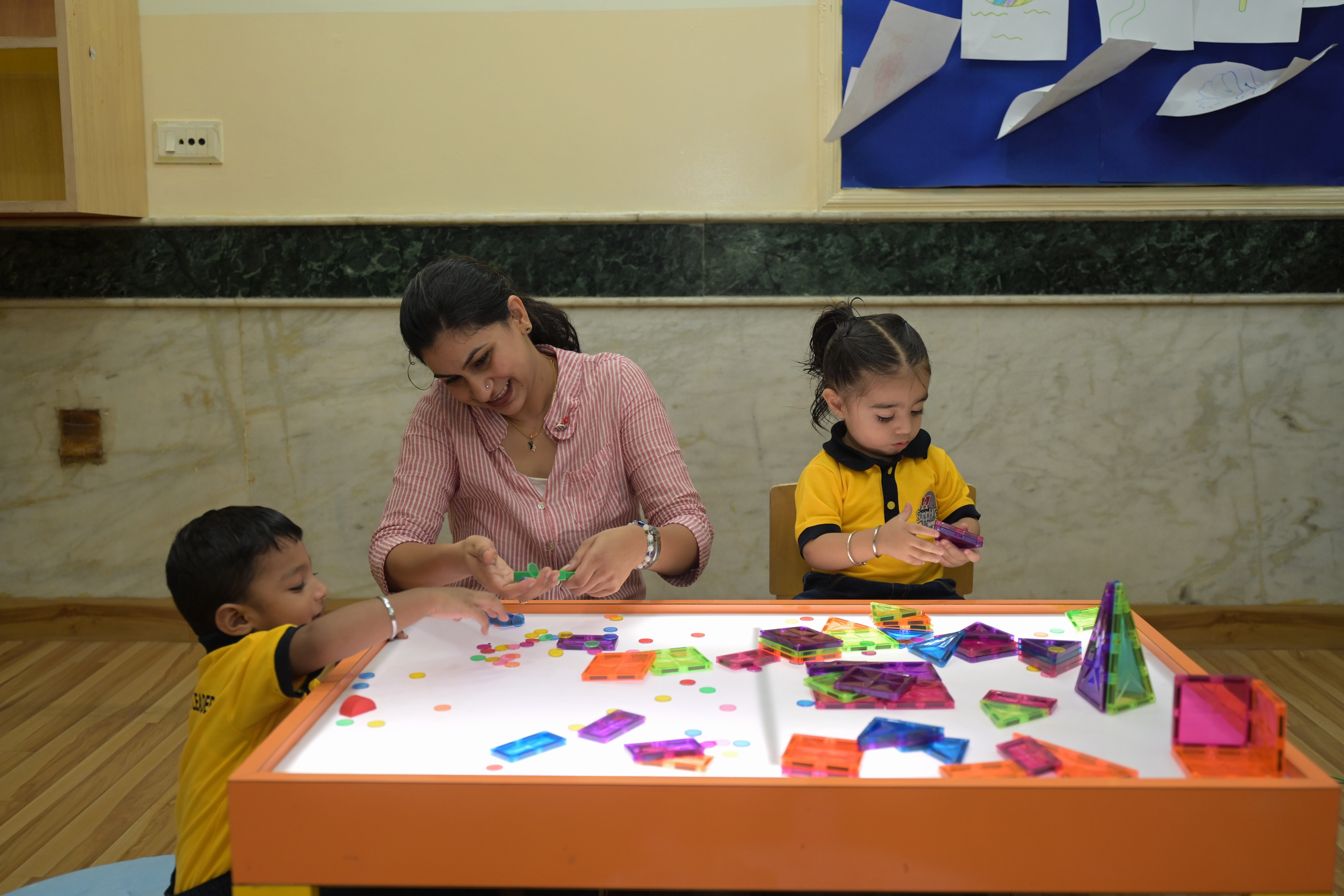 Kids colouring at Sapphire Preschool, Anand Vihar